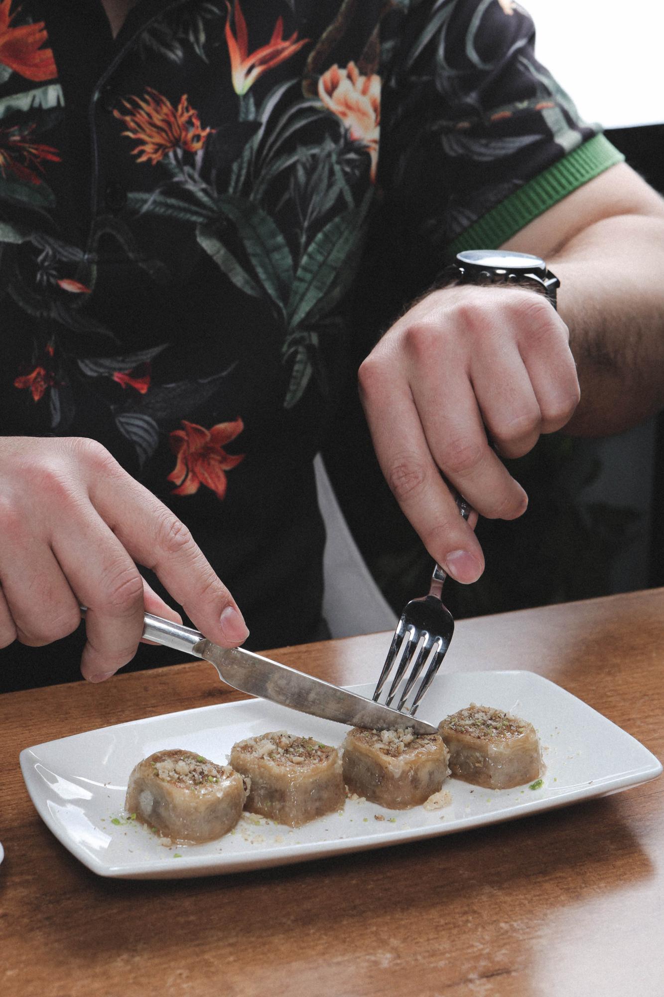 chef arranging canapés on slate